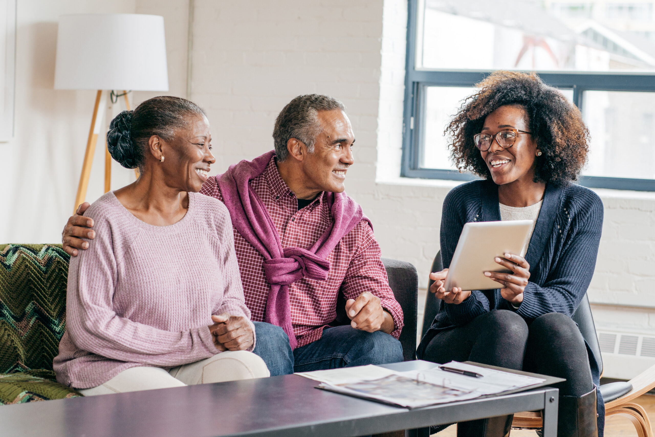 Seniors getting professional advice on tablet from searching with AI